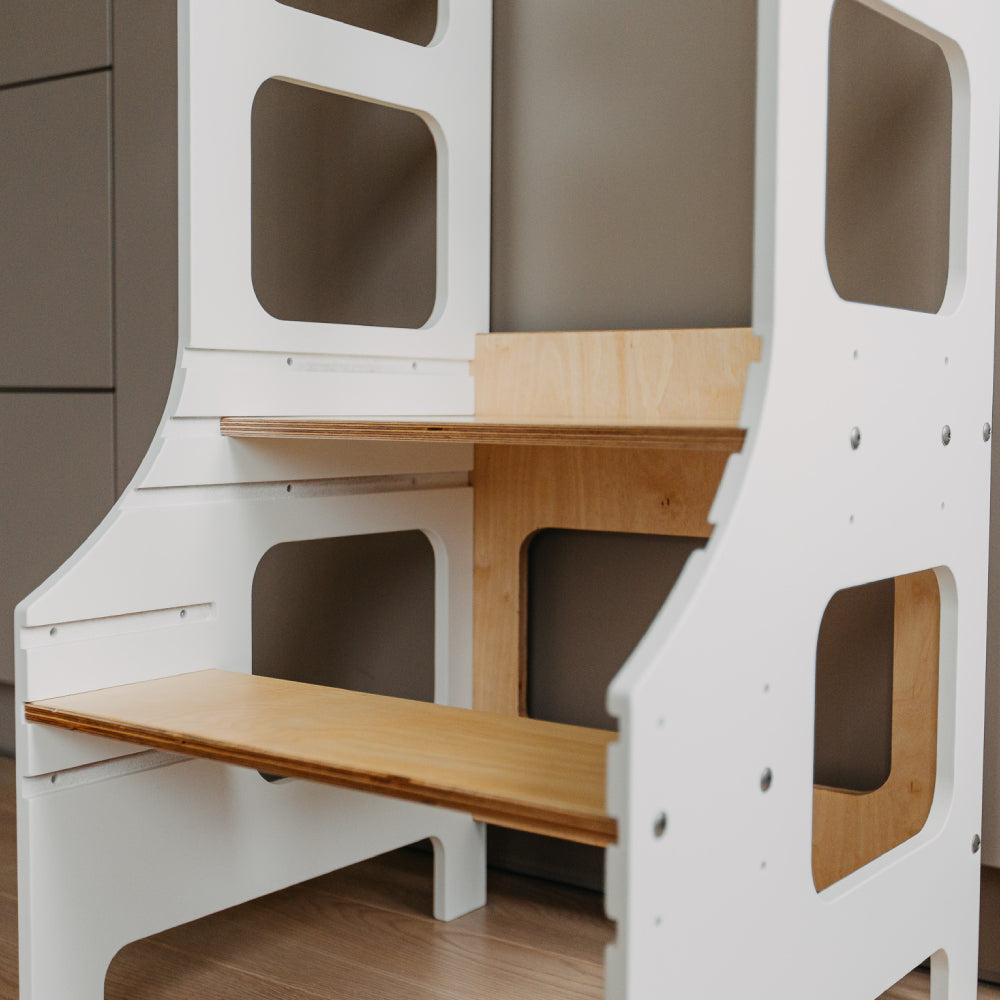 Adjustable height kitchen tower