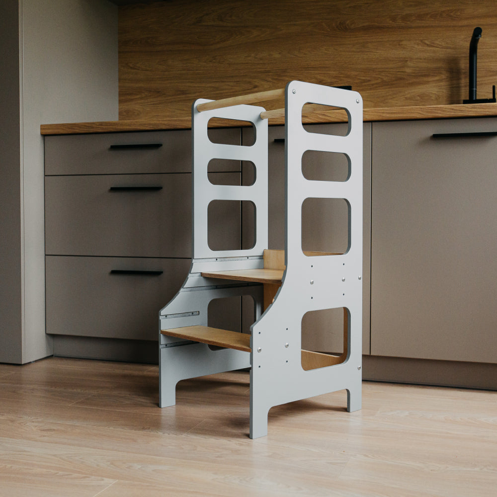 Adjustable height kitchen tower