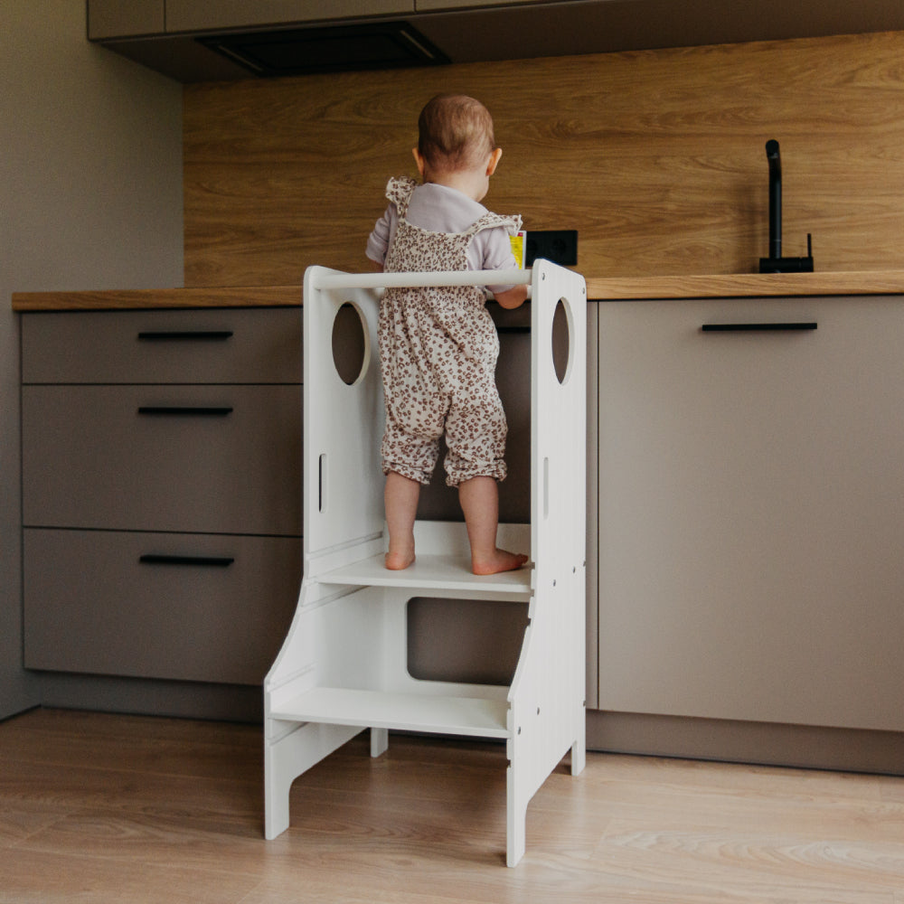 Adjustable height kitchen tower