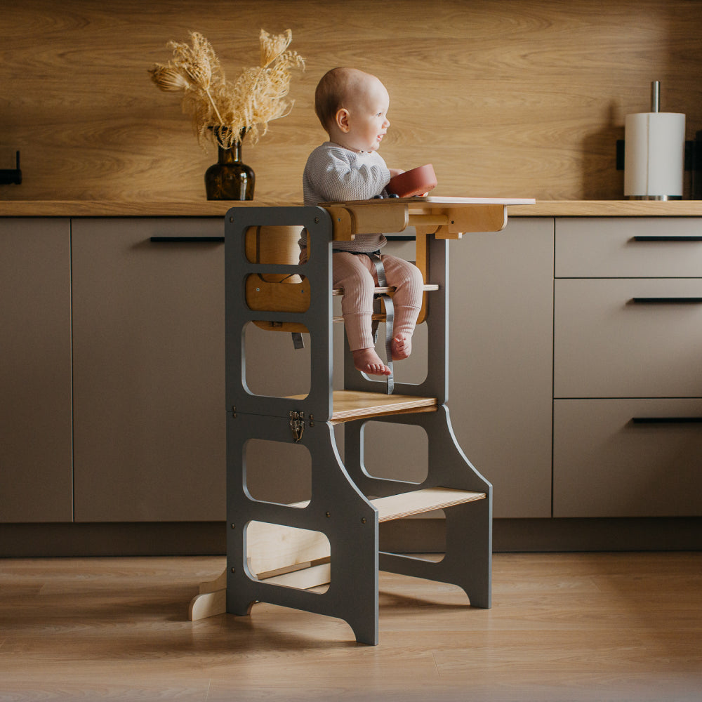 Foldable kitchen tower high chair with a slide
