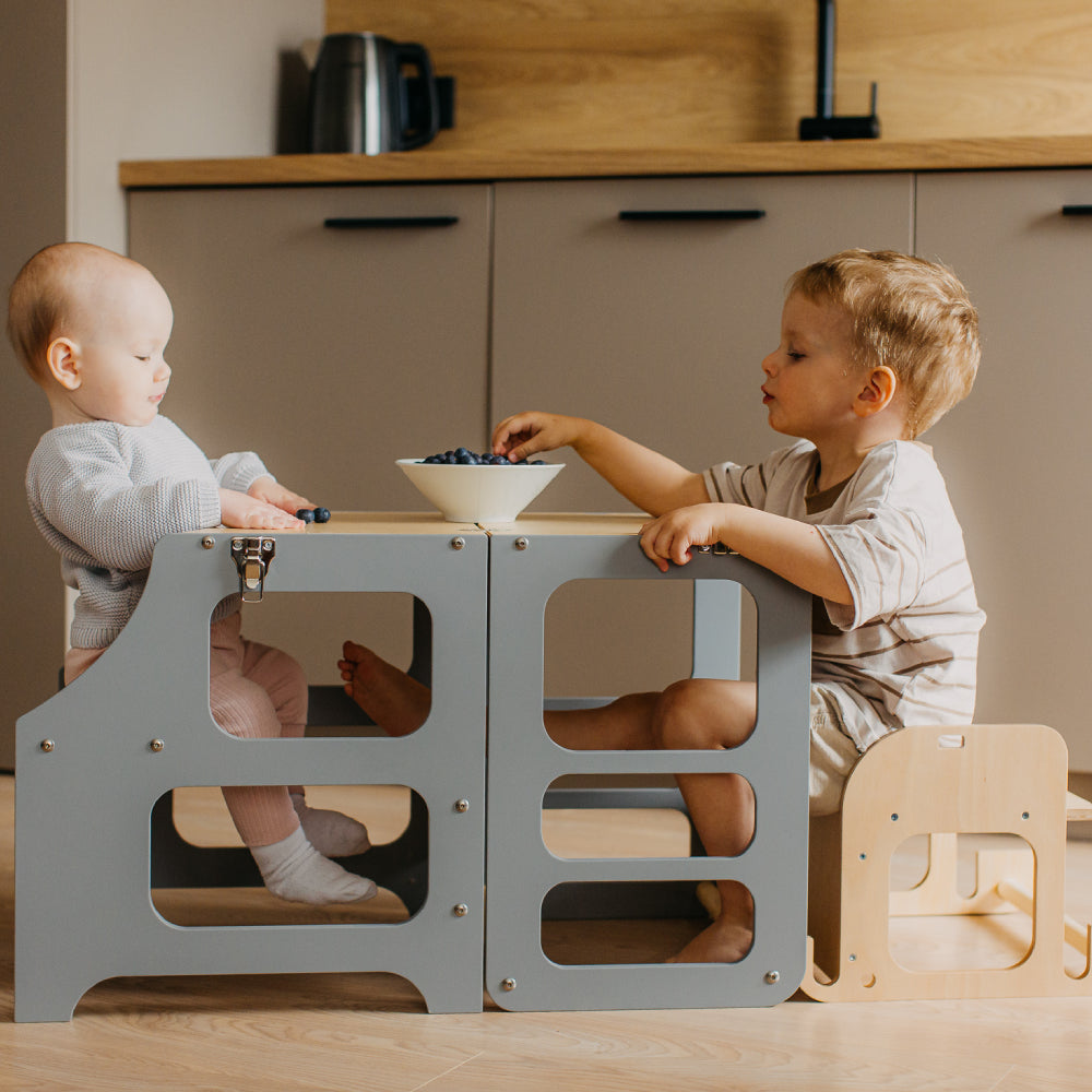Foldable kitchen tower high chair with a slide