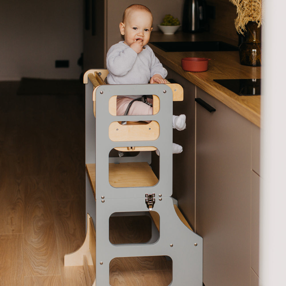 Foldable kitchen tower high chair with a slide
