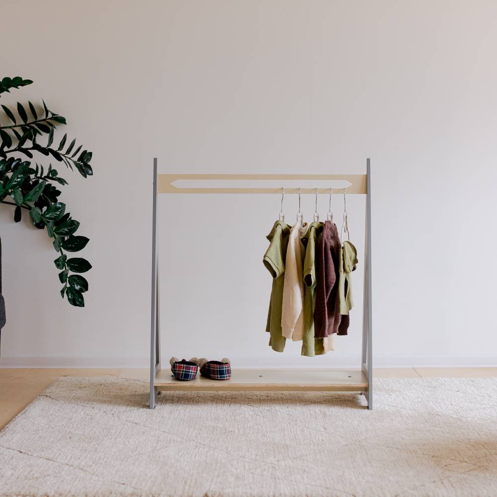 Triangle shaped wooden clothing rack
