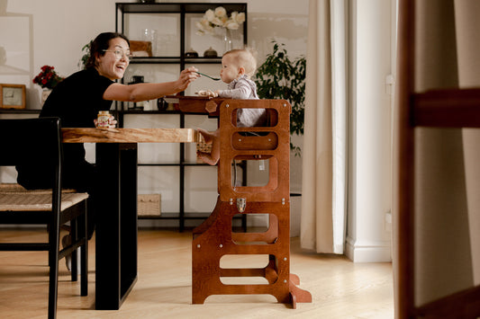 Mid Century Modern Foldable Kitchen Tower with a High Chair for a Toddler